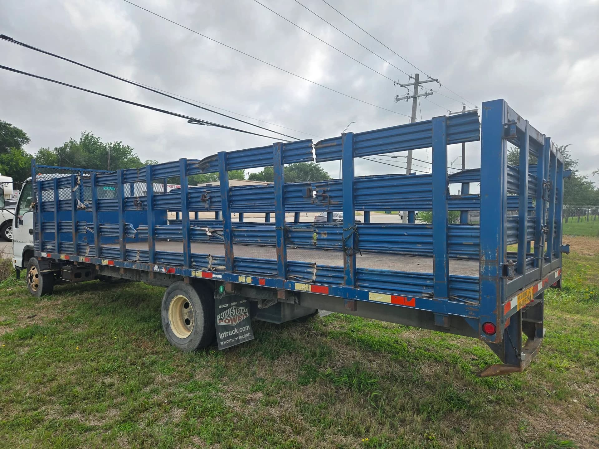 2007 Isuzu NPR stake-bed — photo 11 of 12